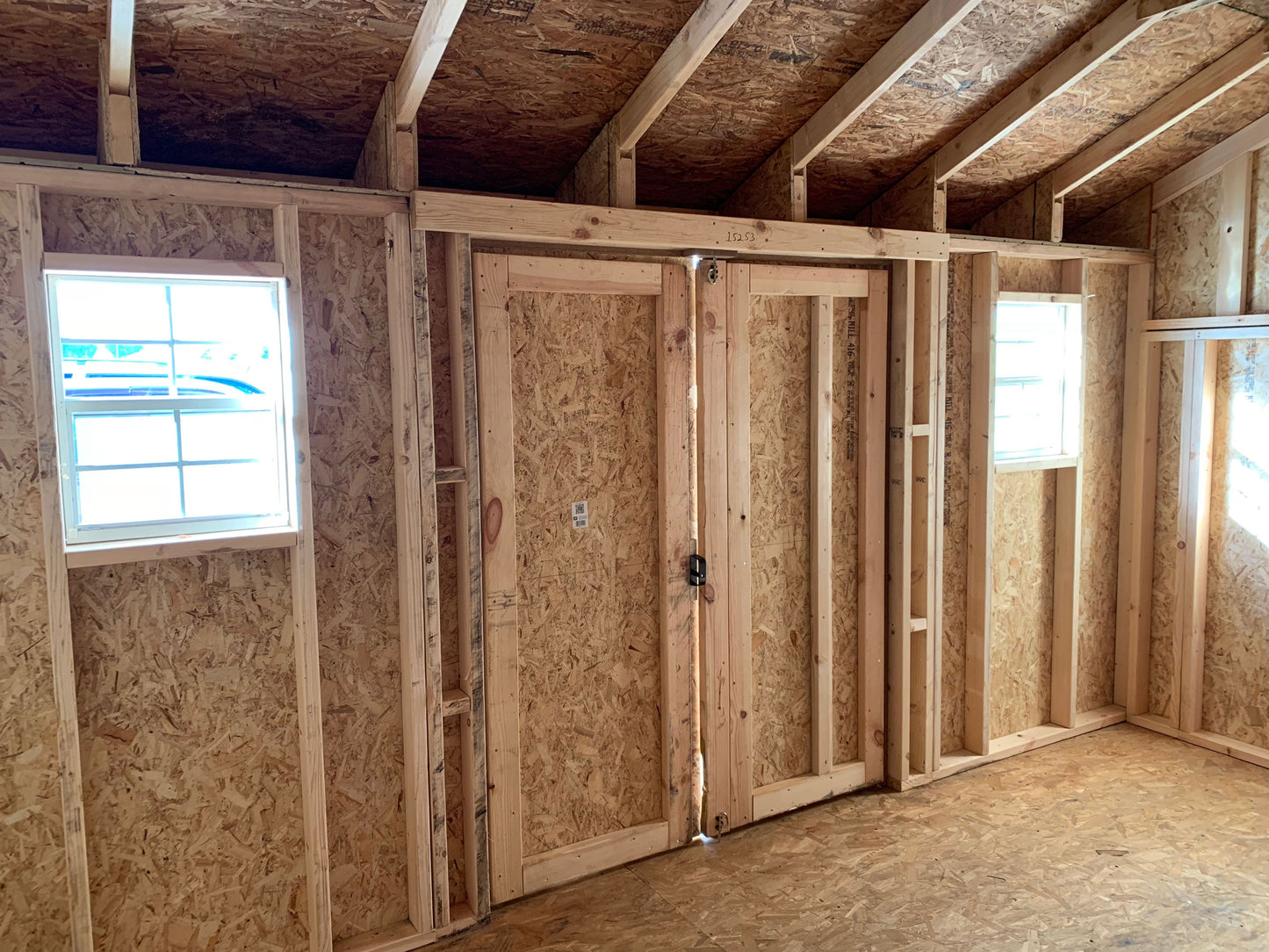 10x14 Classic Saltbox Shed interior facing door and windows